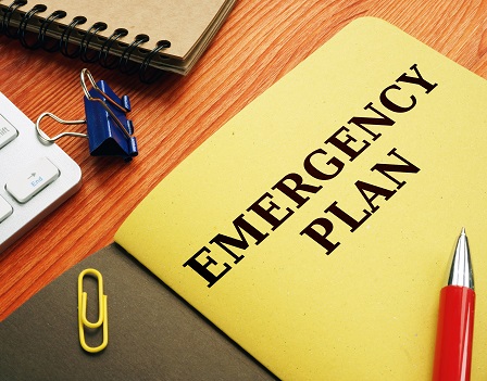 Emergency plan or Disaster Preparedness on the desk.